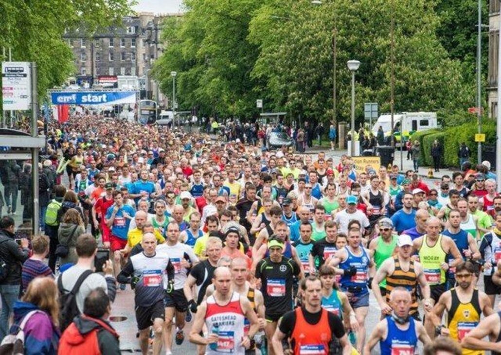 Image shows participants in the Edinburgh Half Marathon.